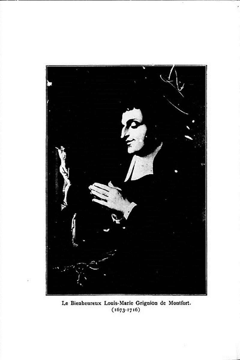 Imagem antiga de São Luís Maria Grignion de Montfort segurando um crucifixo