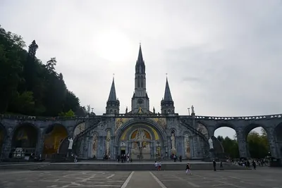 The Basilica of Our Lady of the Rosary of Lourdes, as viewed from the esplanade.jpg